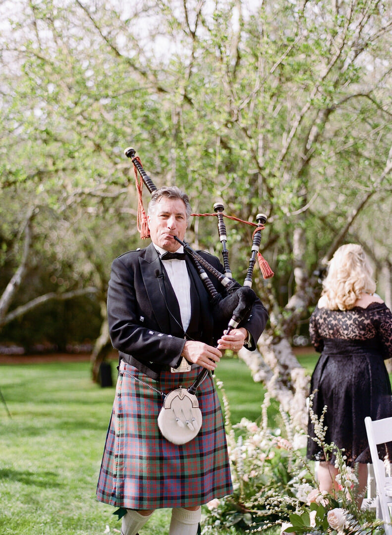 Bag Piper Playing at Wedding Ceremony Photo