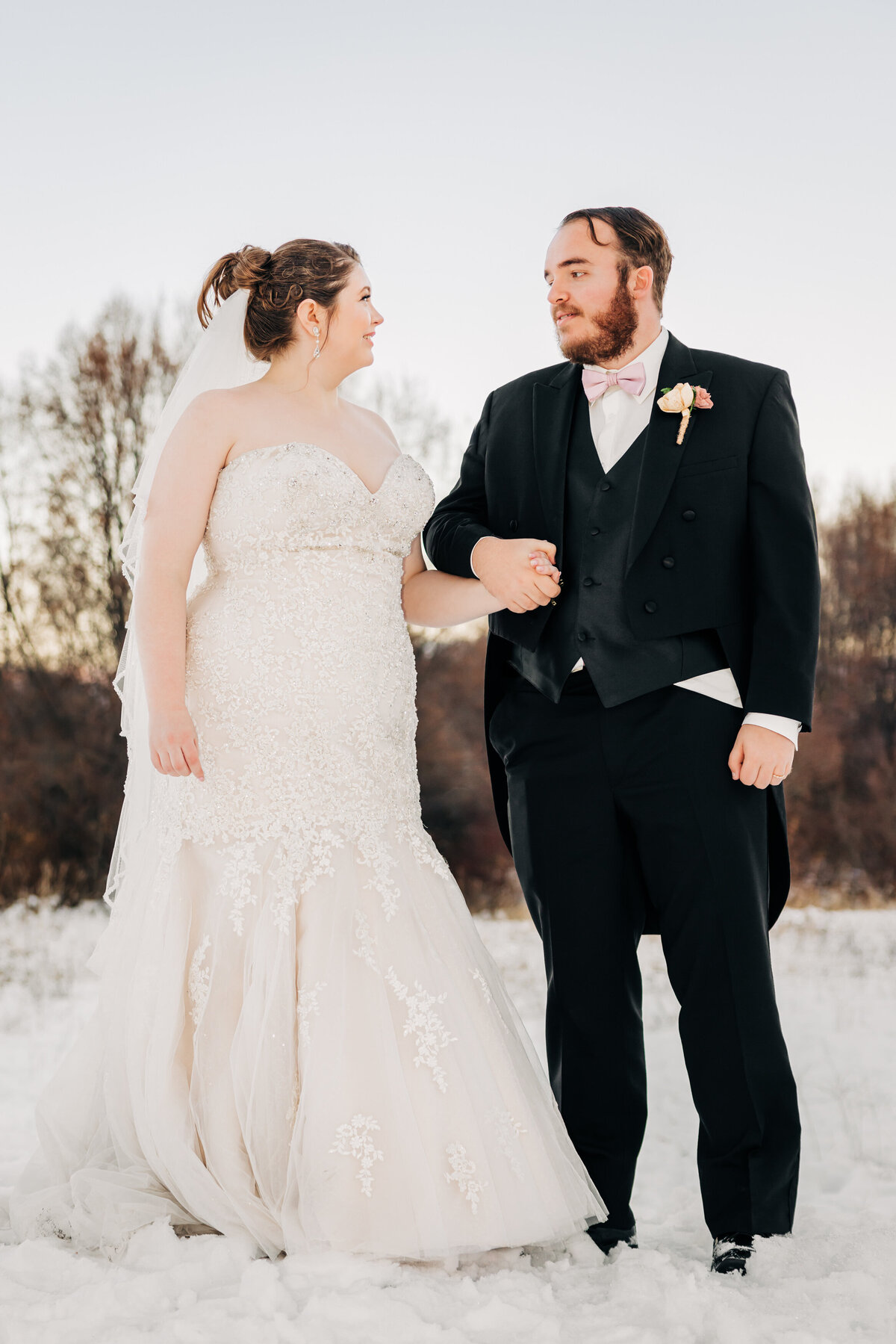 Winter wedding portrait of bride and groom at Bitterroot River Inn in Hamilton, MT