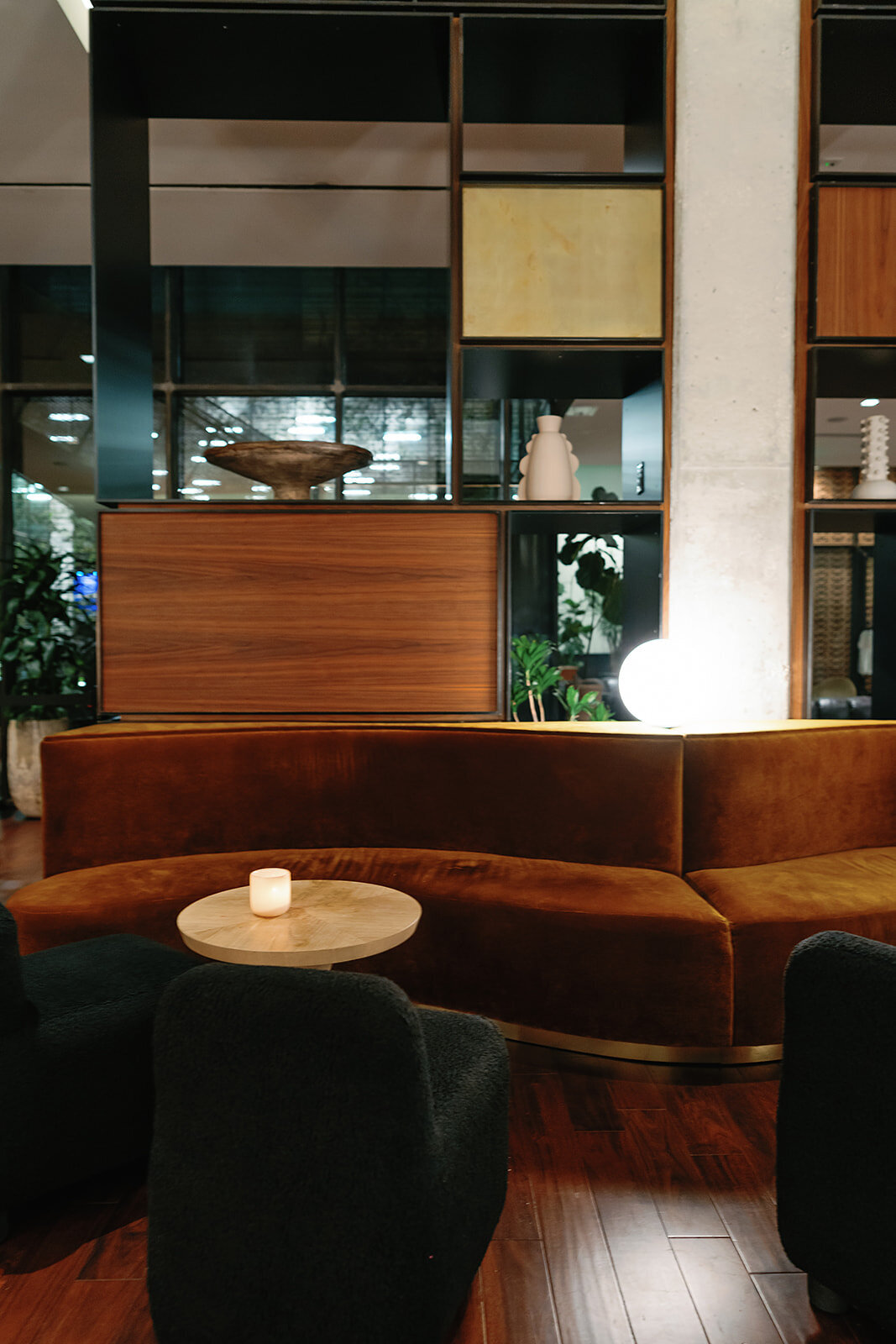 The lobby bar with curved seating at South Congress hotel