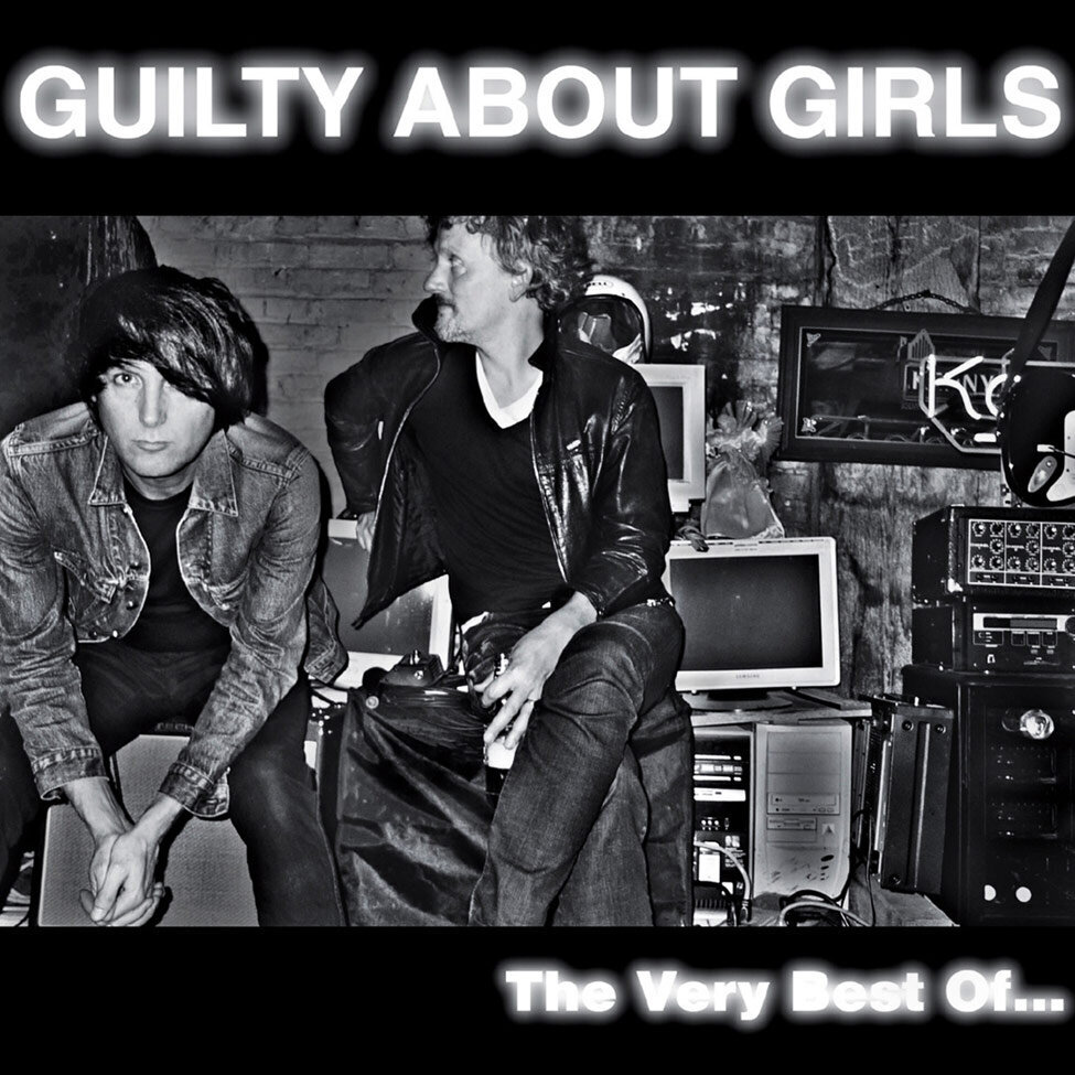 The Very Best Of Album Cover Guilty About Girls black and white two band members sitting amid computer monitors radios and instruments