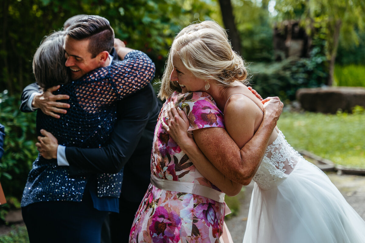Wedding guests smiling and talking during celebration