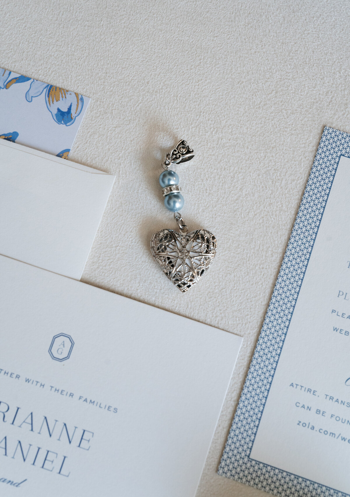 Detail flat lay with wedding rings and stationery at Waverly Oaks