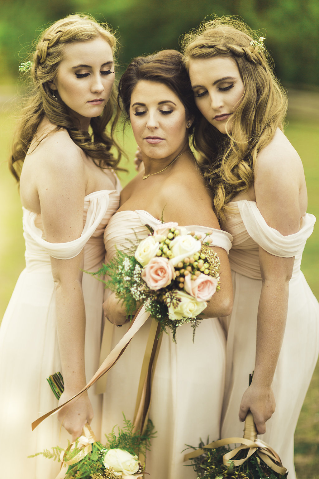 Wedding Photograph Of Women in Peach dresses Holding Bouquets of Flower Los Angeles