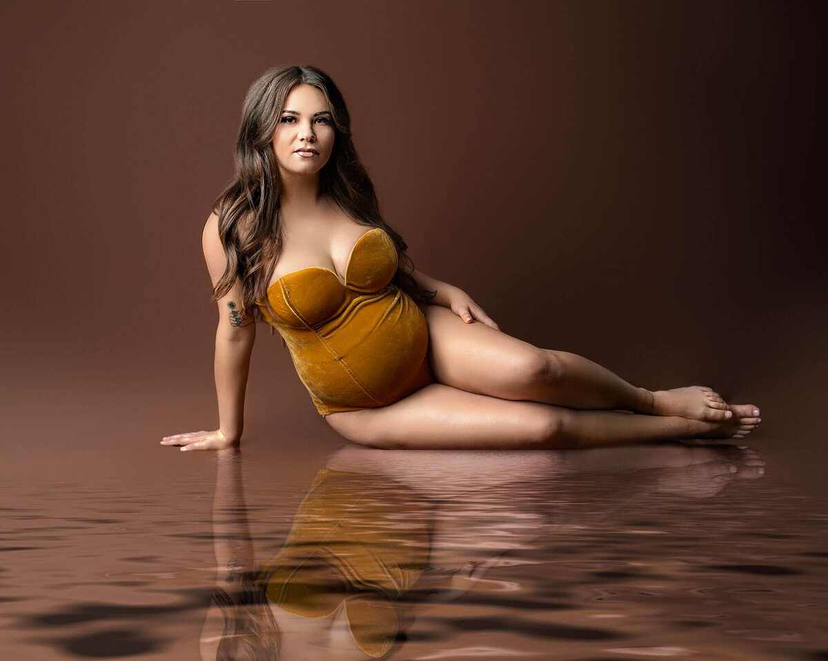 hamilton maternity photographer captures stunning mother wearing gold velvet bodysuit