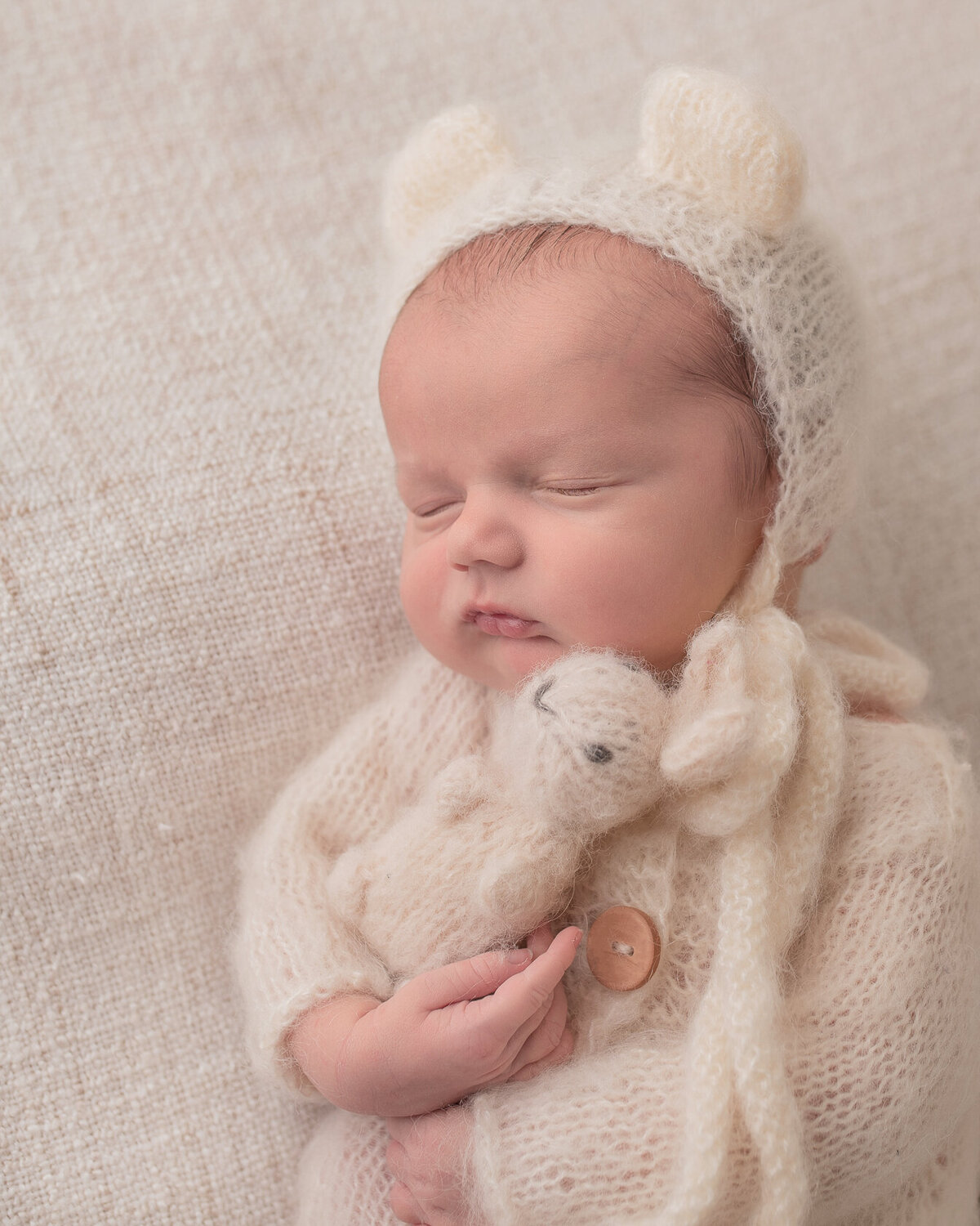 Newborn Photography with a Bunny friend, captured by Laura King Photography
