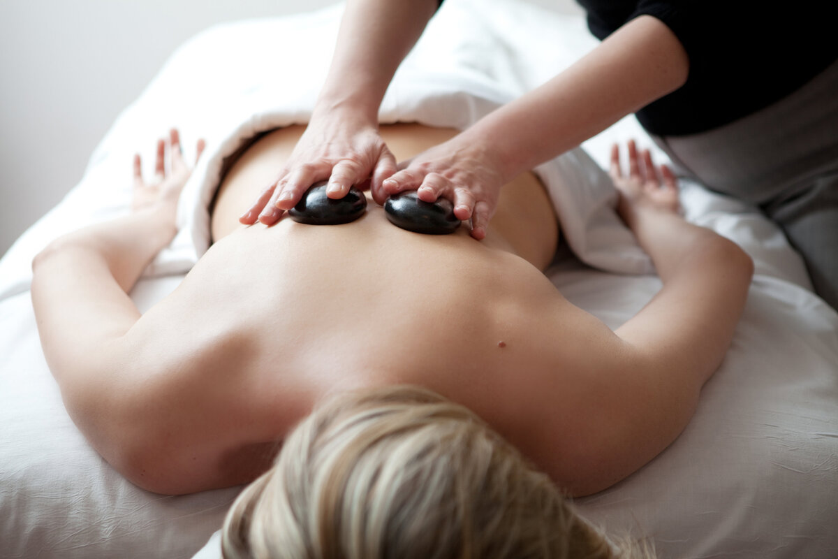 Hot stones on a back during a massage