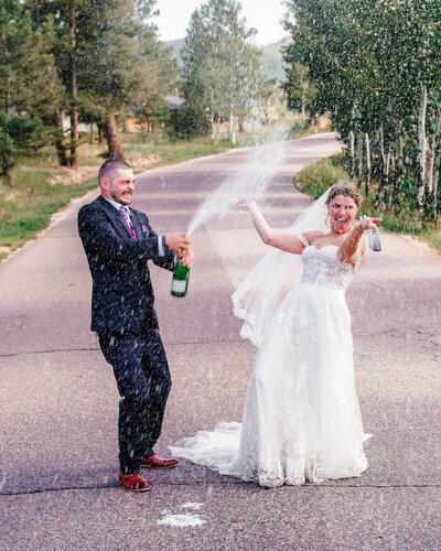 denver_wedding_photography_-_man_spraying_champagne2