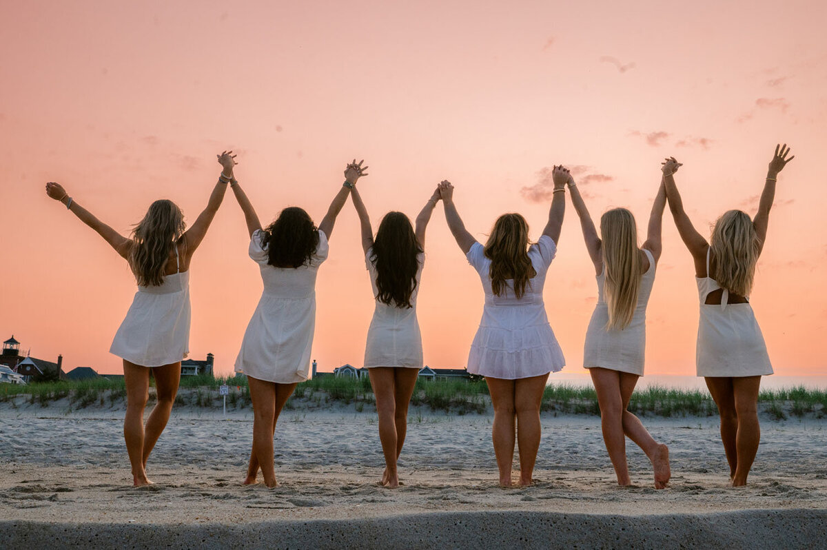 NJ senior photoshoot fun friends shoot cap and gown spring lak sea girt beach shoot white dresses-380