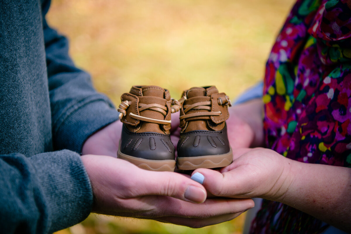 Benson Park New Hampshire maternity session with baby shoes