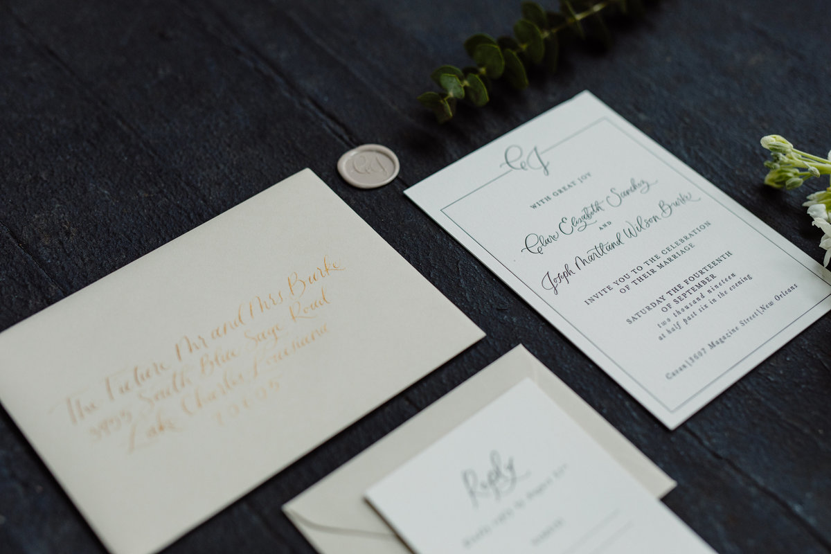 classic letterpress invitation with monogram and calligraphy houston texas