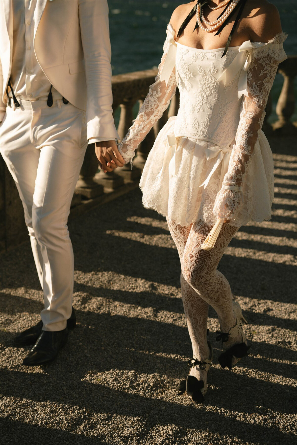 elopement in lake como couple walking together