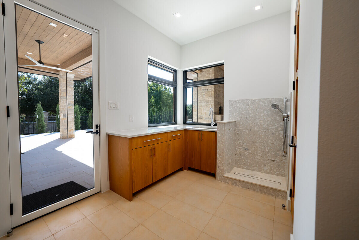 Custom home with mudroom and pet shower