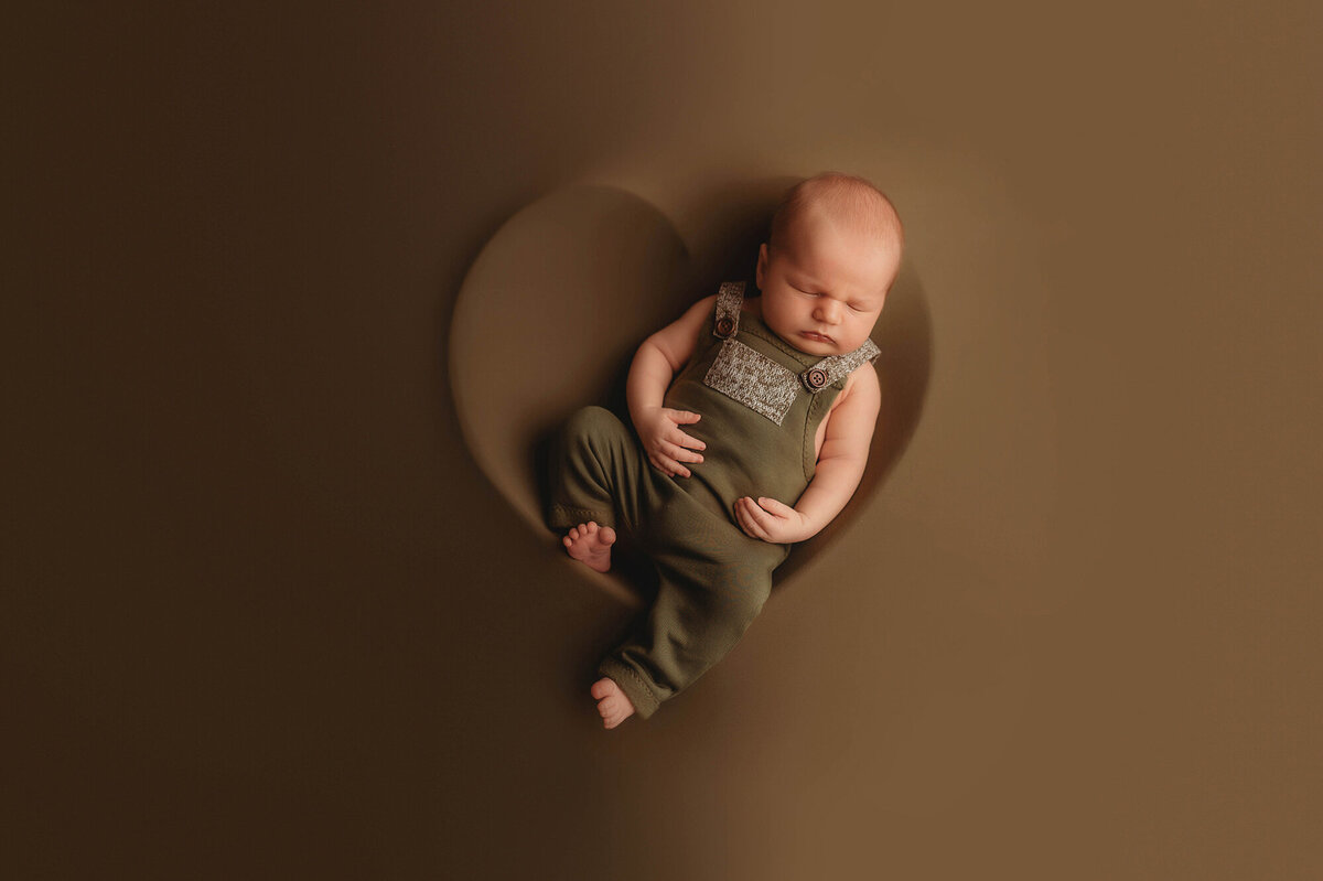 Baby posed for Newborn Photos in Charleston.