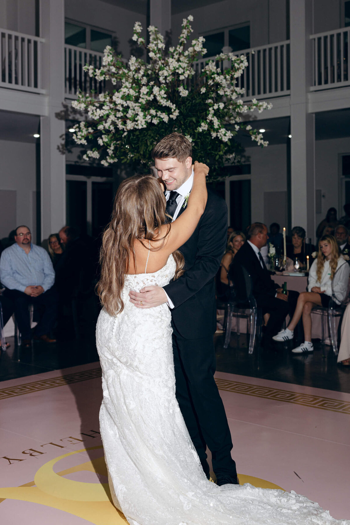 A photo of the bride and groom dancing during the wedding reception