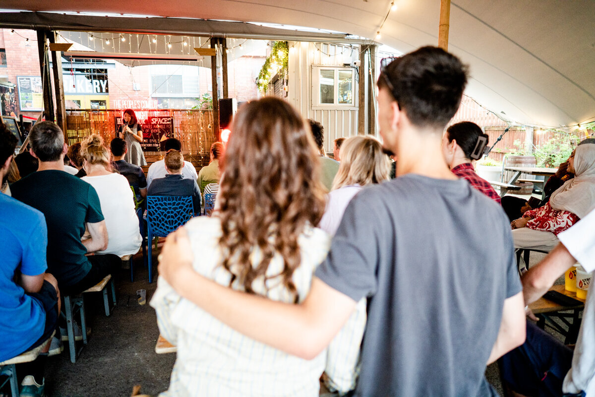 photography of a staffordhire oatcake with a side of brown sauce