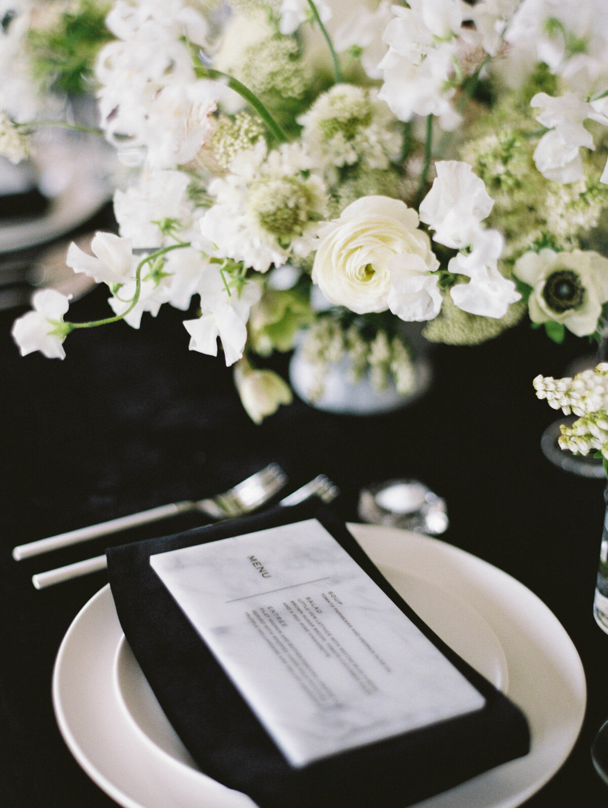 max-owens-design-black-white-modern-wedding-12-menu-centerpiece