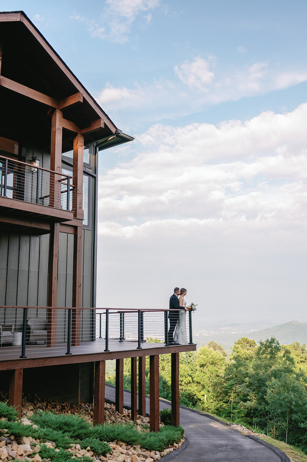Bride and groom pictures overlooking the mountains at The Trillium