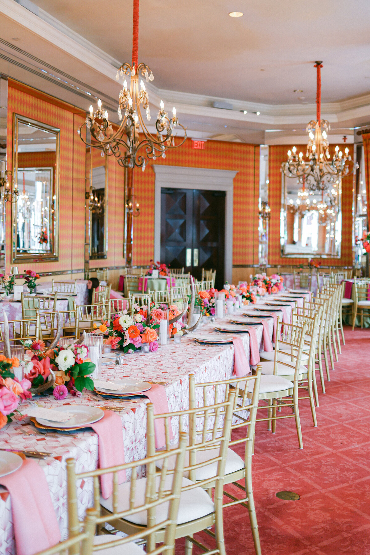 A wedding day photo of the reception hall and tables