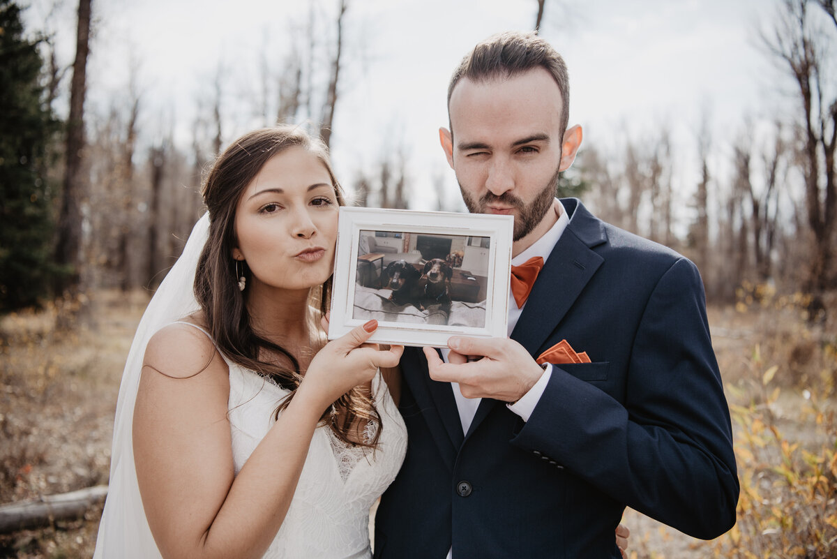 Photographers Jackson Hole capture couple holding picture