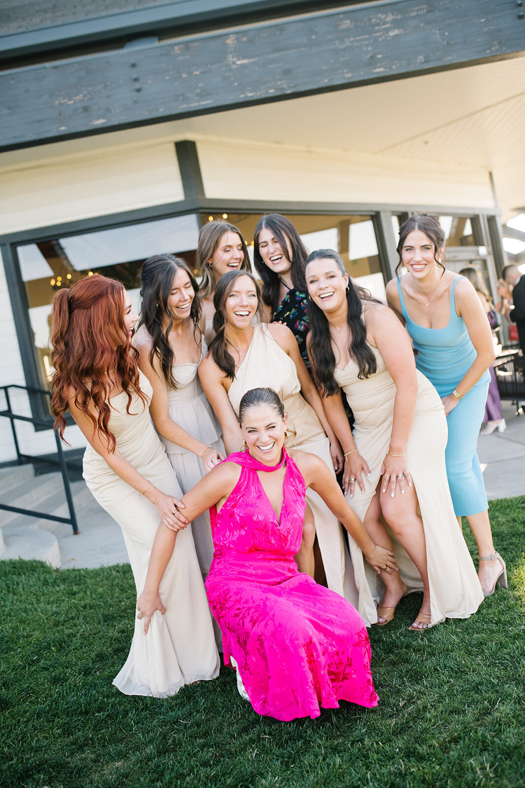 Unposed moment of a child dancing freely at a wedding reception in Colorado