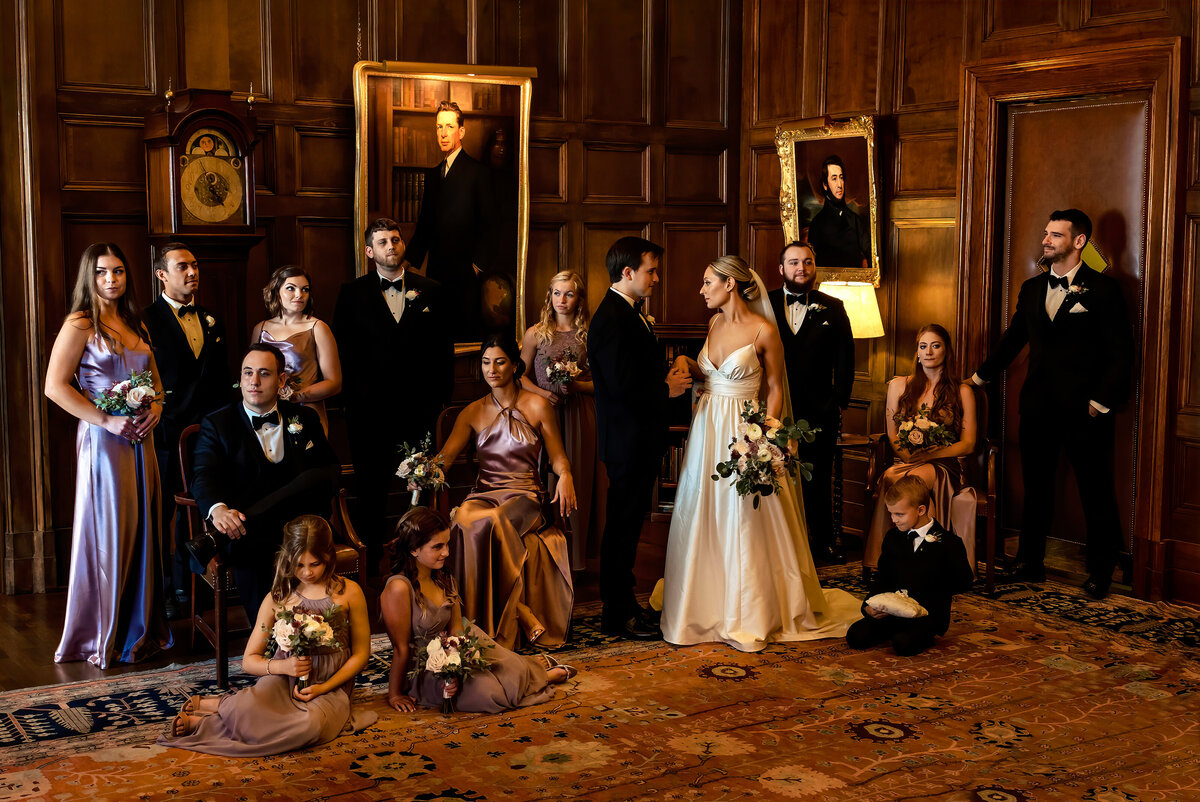 A portrait of the bridal party as everyone strikes a serious pose.