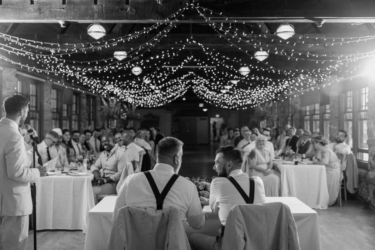 grooms at wedding reception