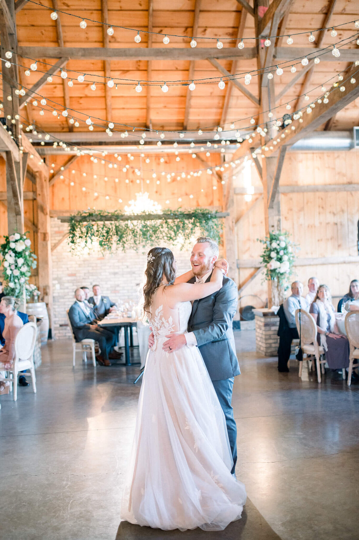 Bride and groom dance at their Toronto barn wedding