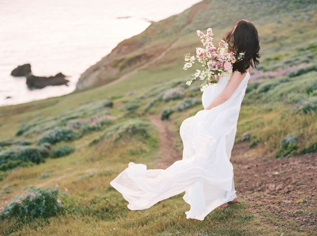maternity photography in san francisco bay area with a woman holding a bouquet