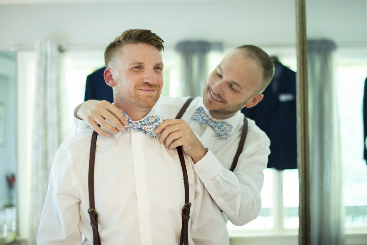 Grooms getting ready at wedding