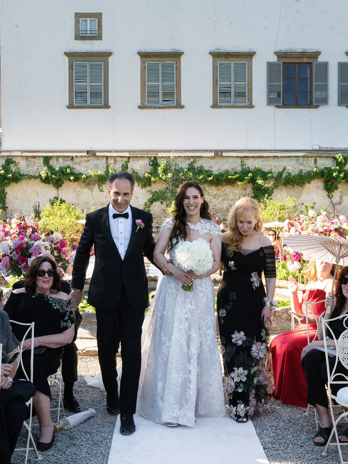 070-Bride-And-Parents-Walking-Down-Aisle-at-Villa-Corsini