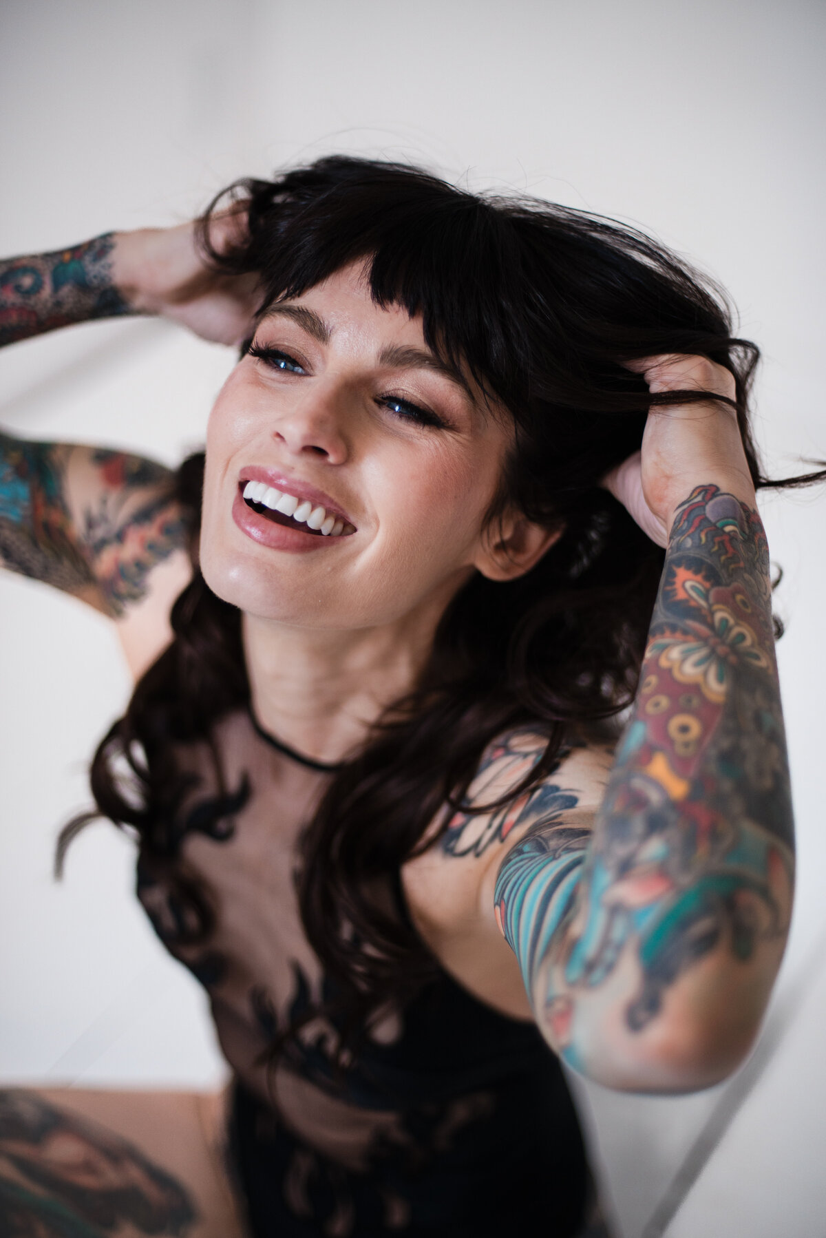 Intimate boudoir photography highlighting natural beauty and confidence boosting