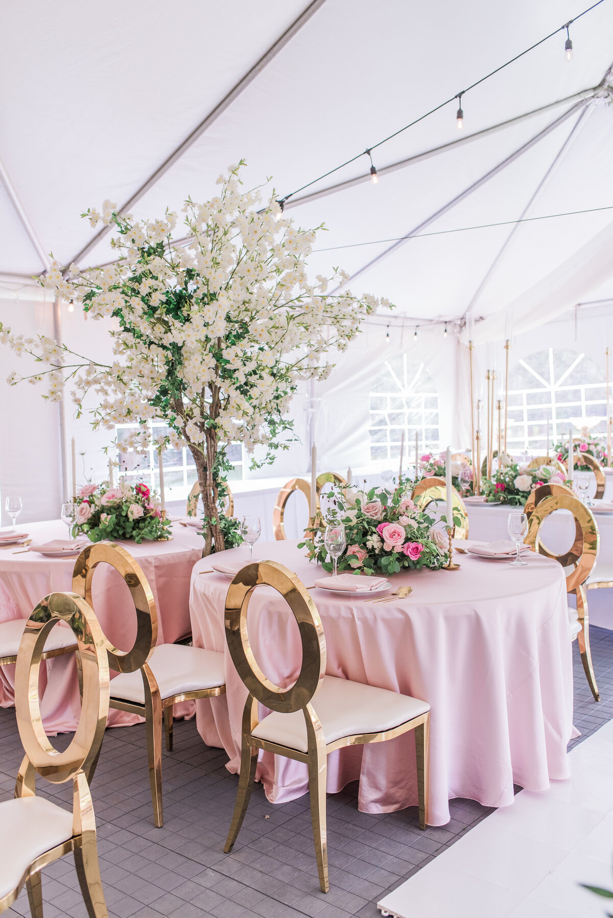 gold infinity chairs, pink linens, pink florals