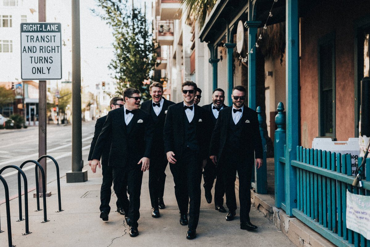 Grromsmen walking downtown Tucson