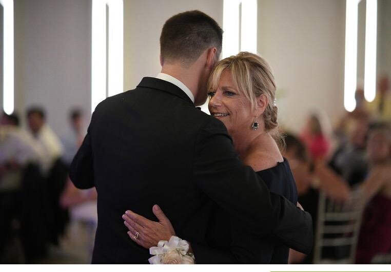 sue dancing with her son