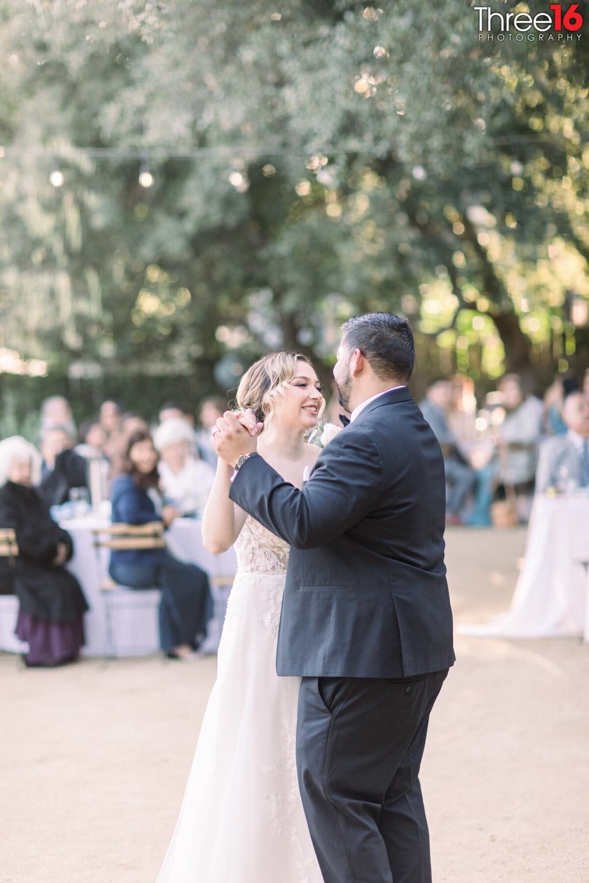 Tender moment during couple's first dance