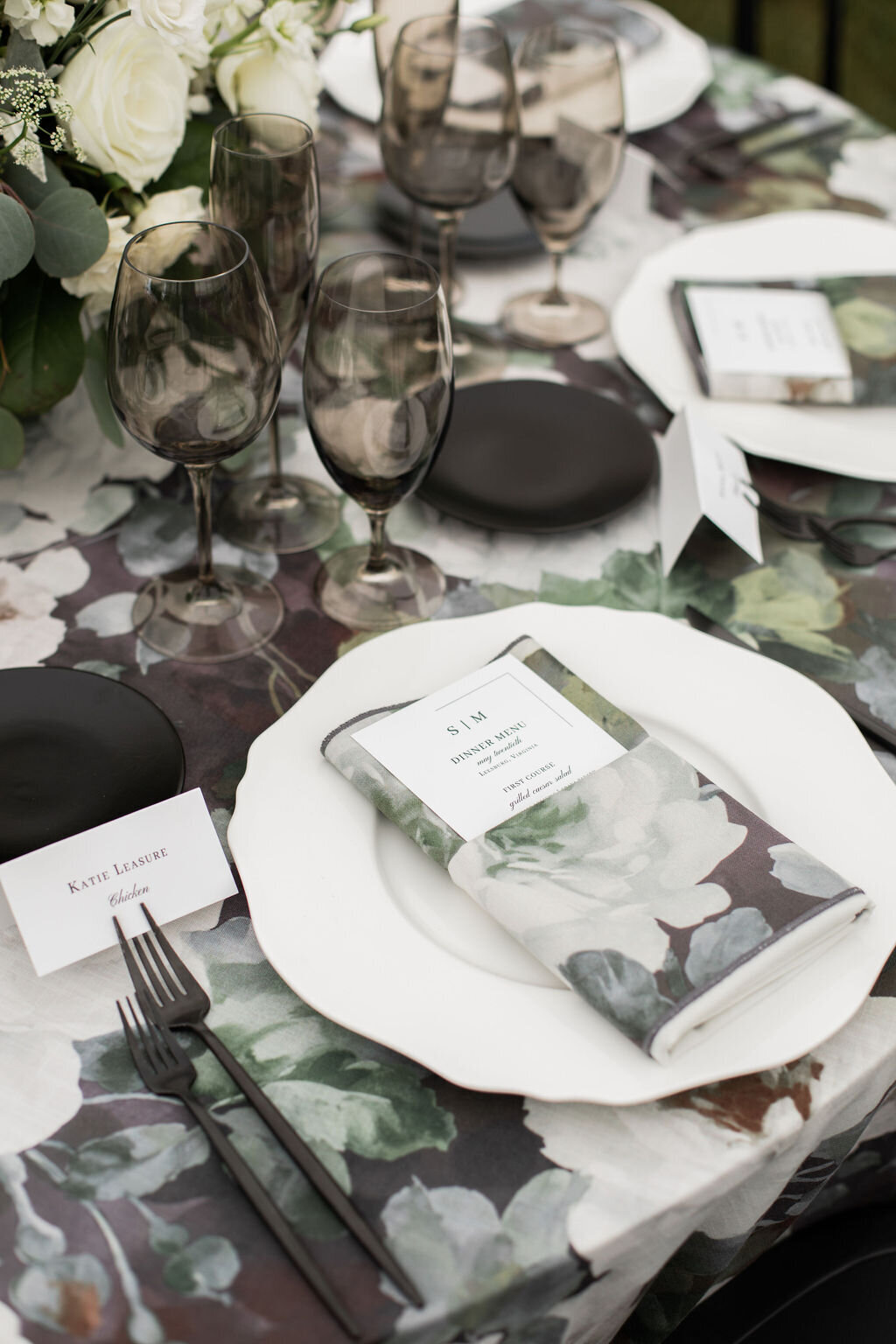 Bold modern tented wedding design with black and green elements and statement linens from BBJ La Tavola