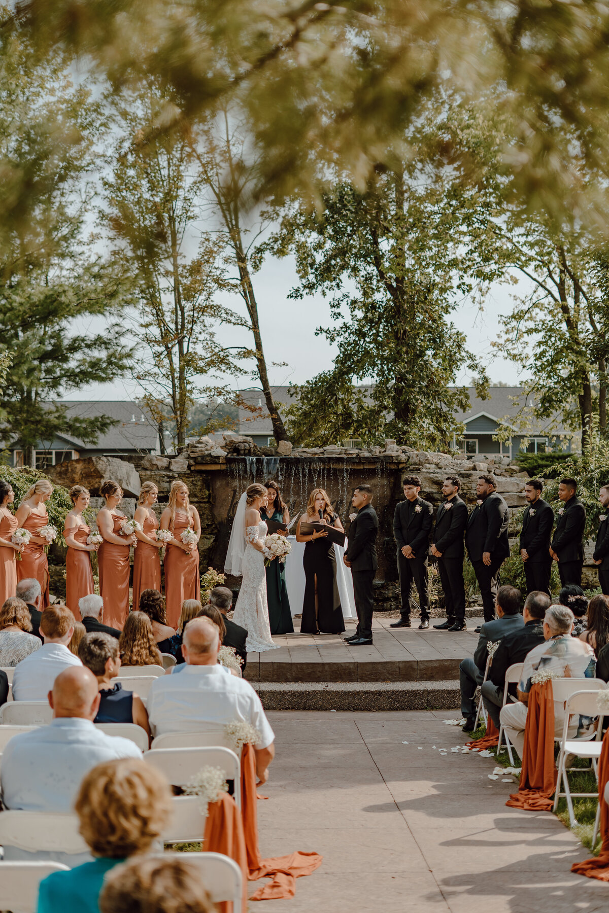 storyteller-collective-photo-co-waterfall-wedding-ceremony-wide-shot-des-moines-wedding-photographer