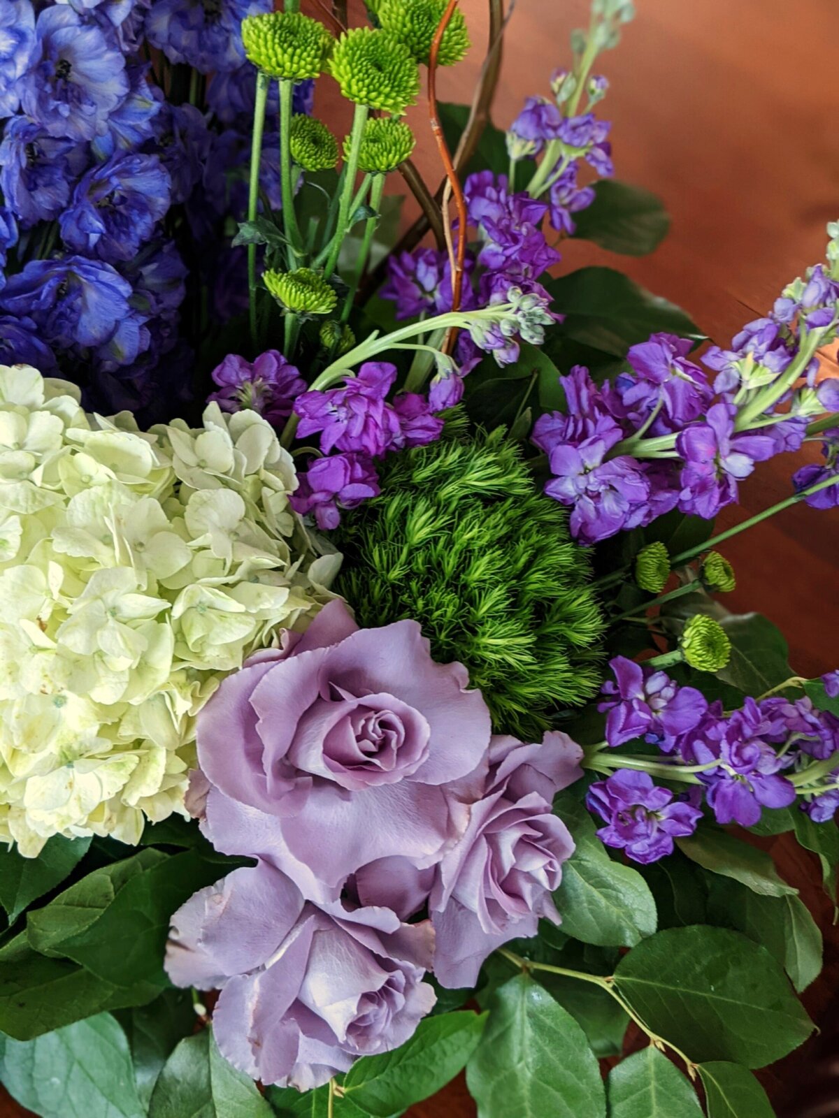 funeral and sympathy floral individual arrangement enlarged purple