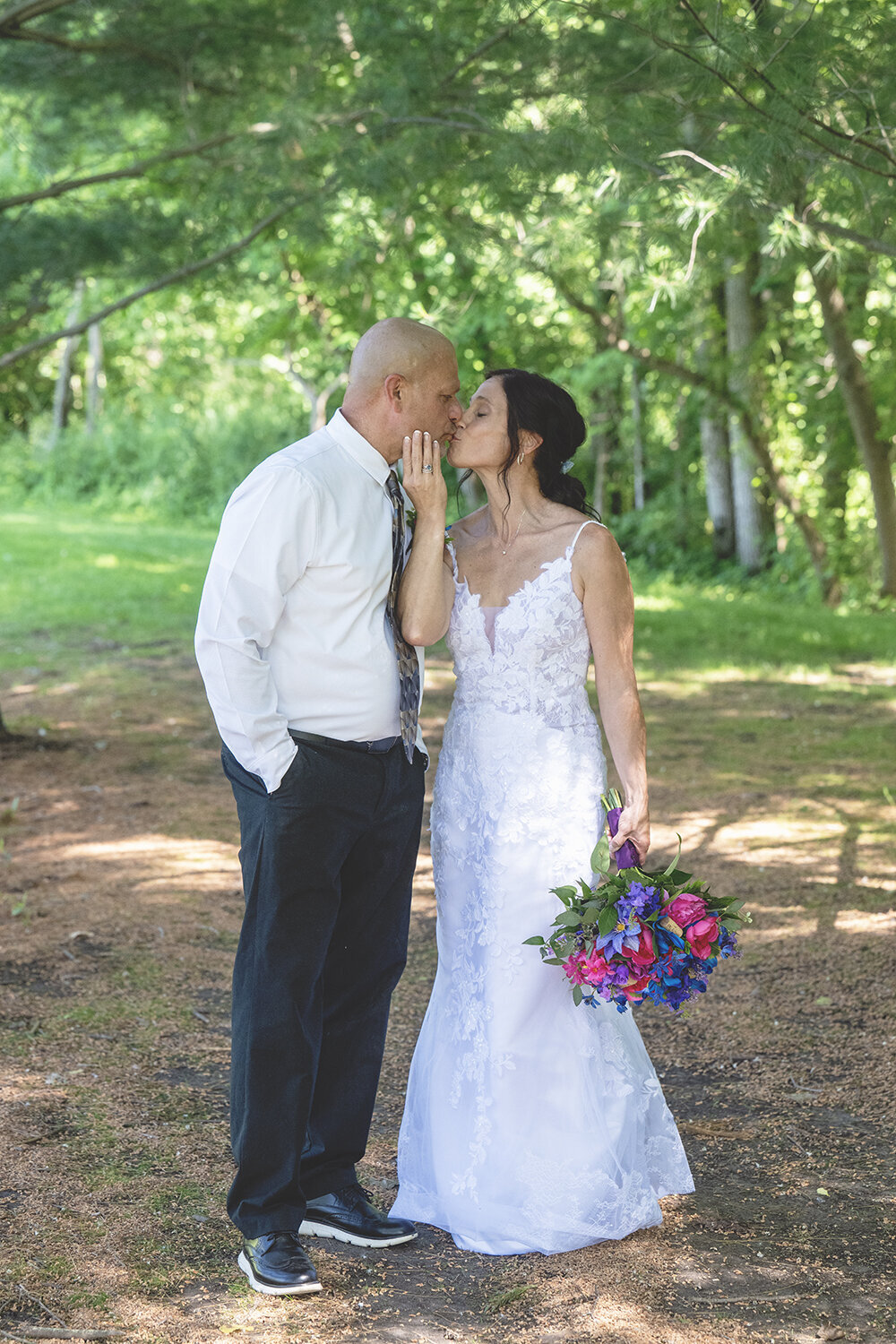 DC Estate Winery kiss greenery South Beloit Wedding Photography
