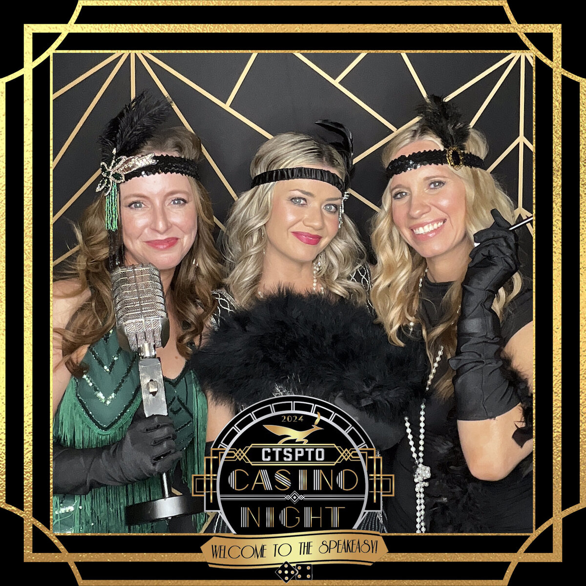 Three women dressed in glamorous 1920s flapper attire posing in a Great Gatsby–themed photo booth at a Casino Night event—captured by MISGIF Photo Booth with a custom speakeasy frame and vintage-inspired backdrop.