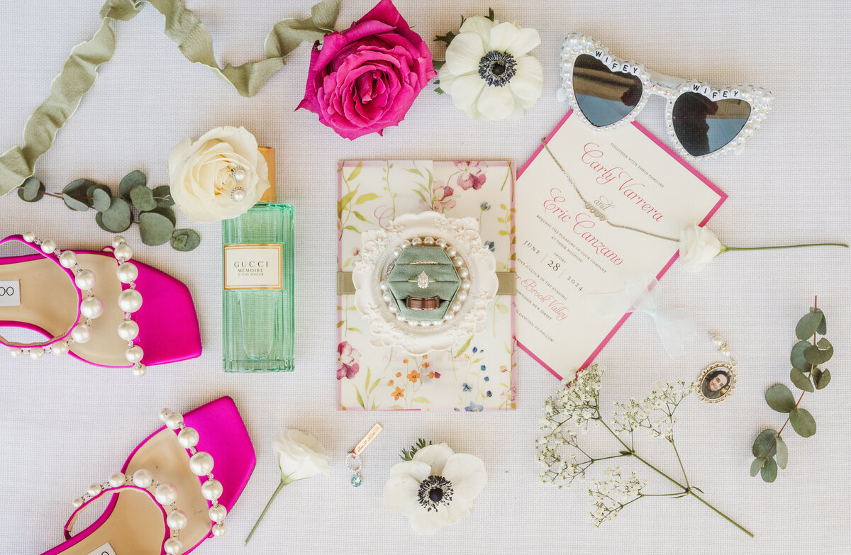 hot pink wedding theme details flatlay