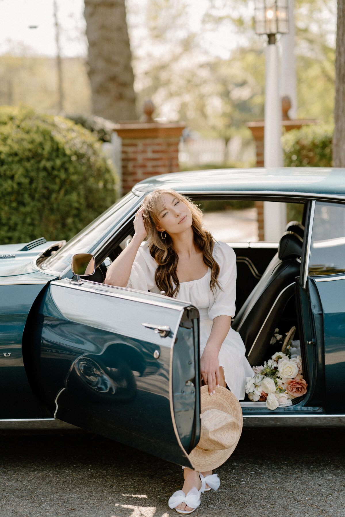 bride sitting in a car at at white chimneys estate wedding, Lancaster, PA