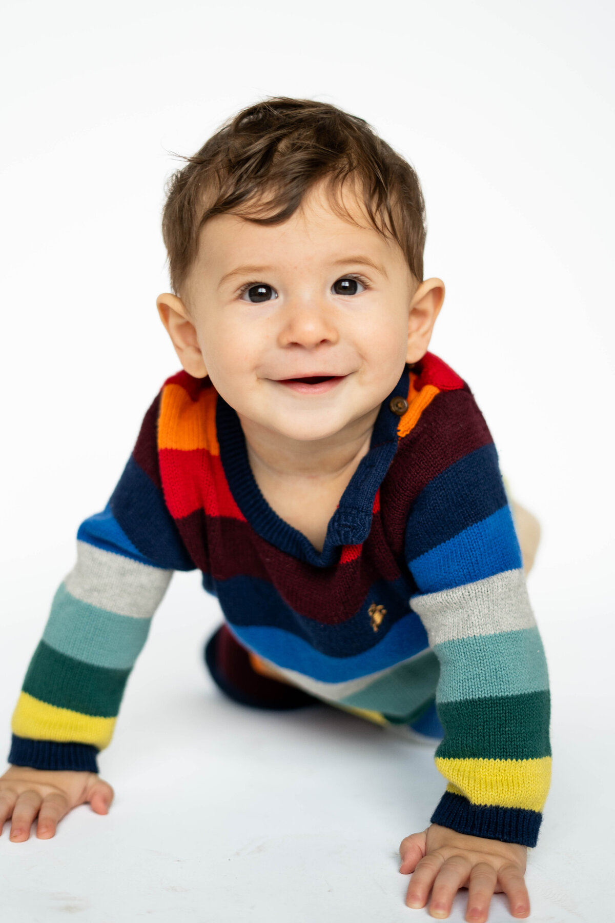 Baby crawling in preschool photo