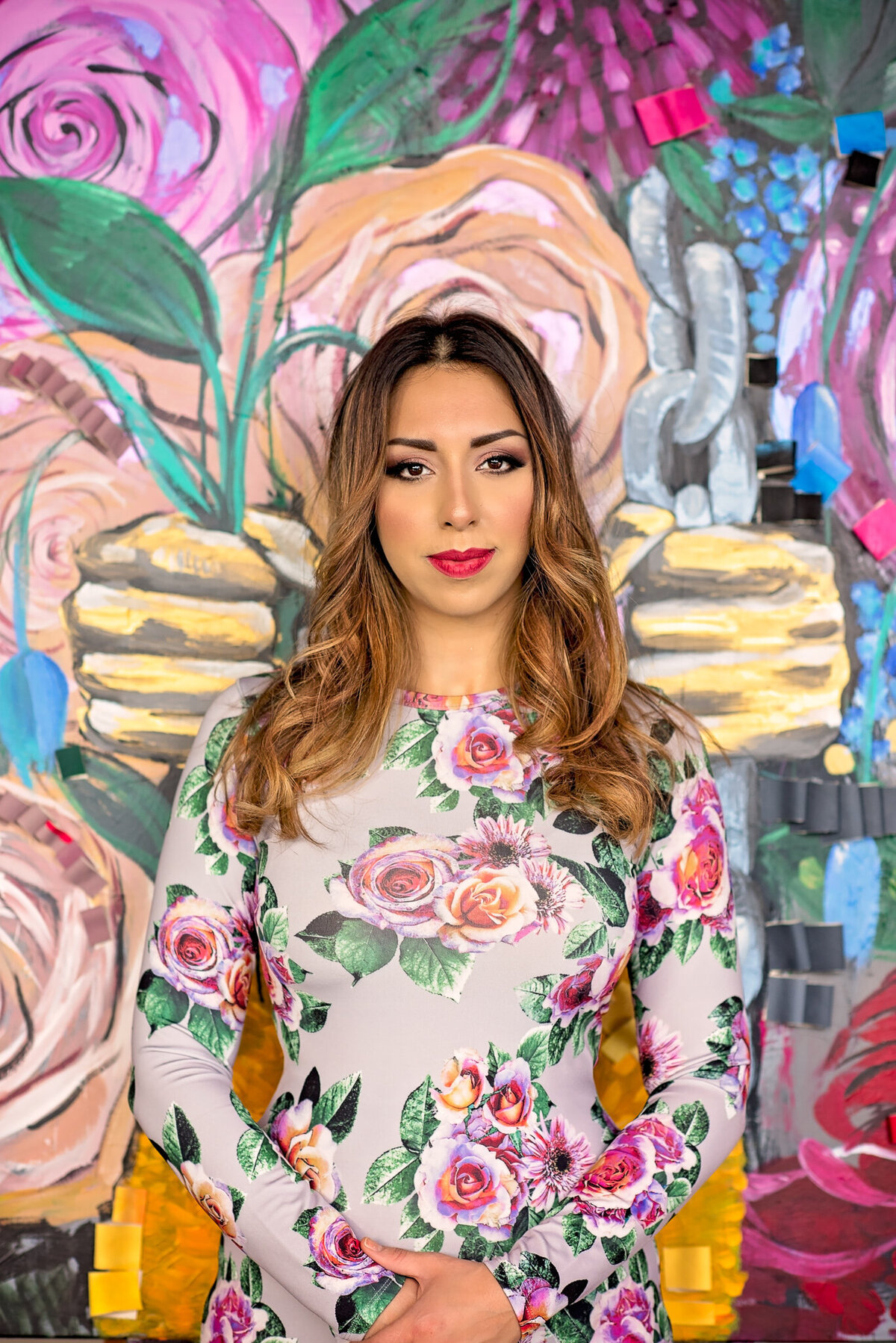 Branding portrait of an Iranian artist photographed in Seattle, shown holding her painting, created for creatives who want powerful images that highlight their artistry and elevate their brand.