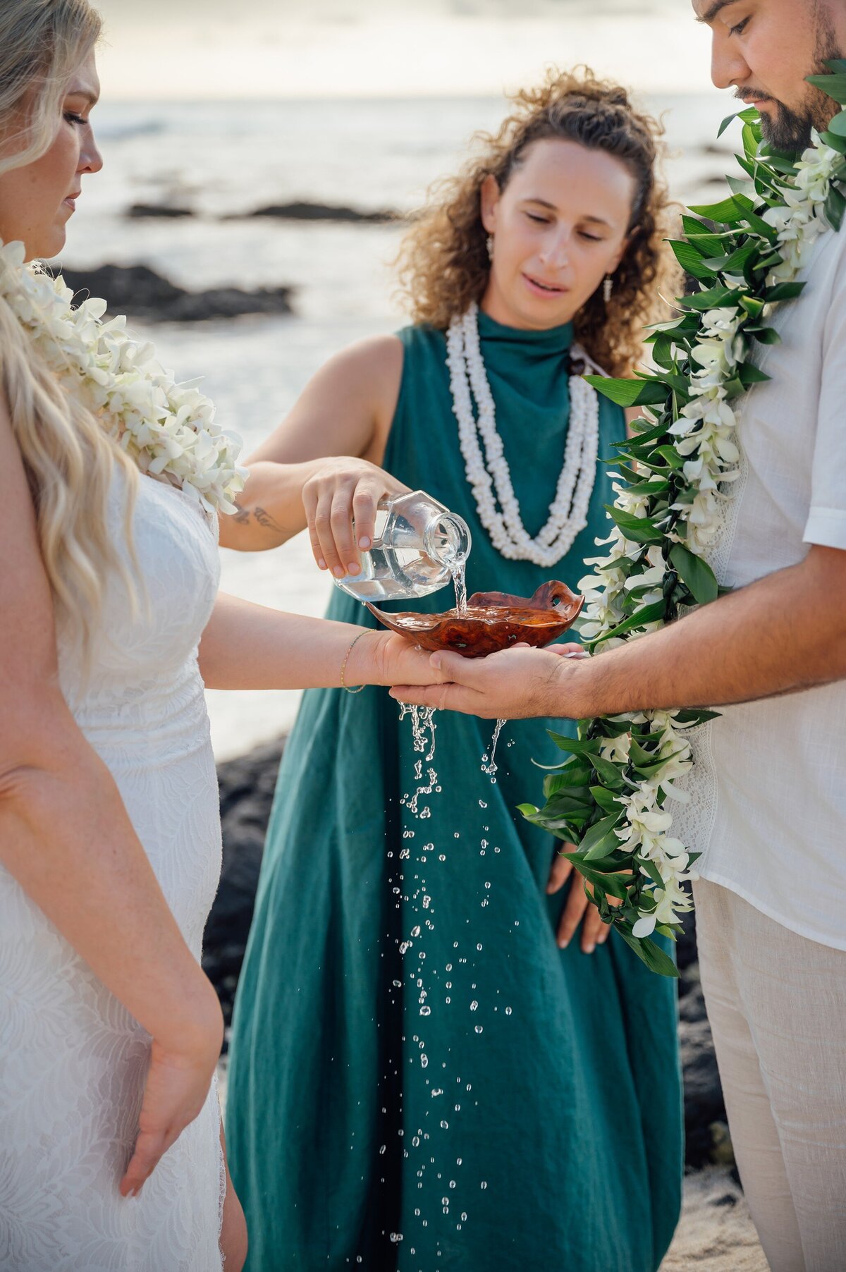 the pouring of ocean water over the rings during a wedding ceremony