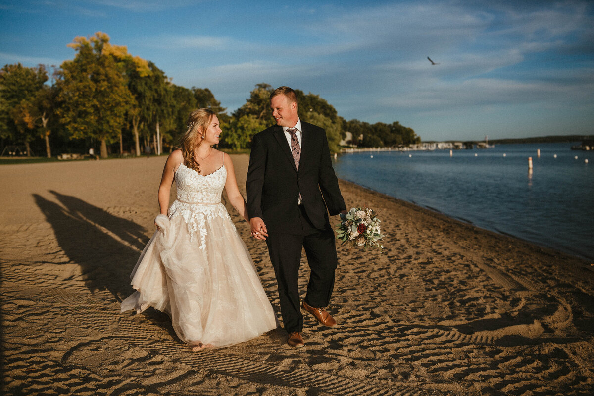 bride-and-groom-walking-on-the-beach