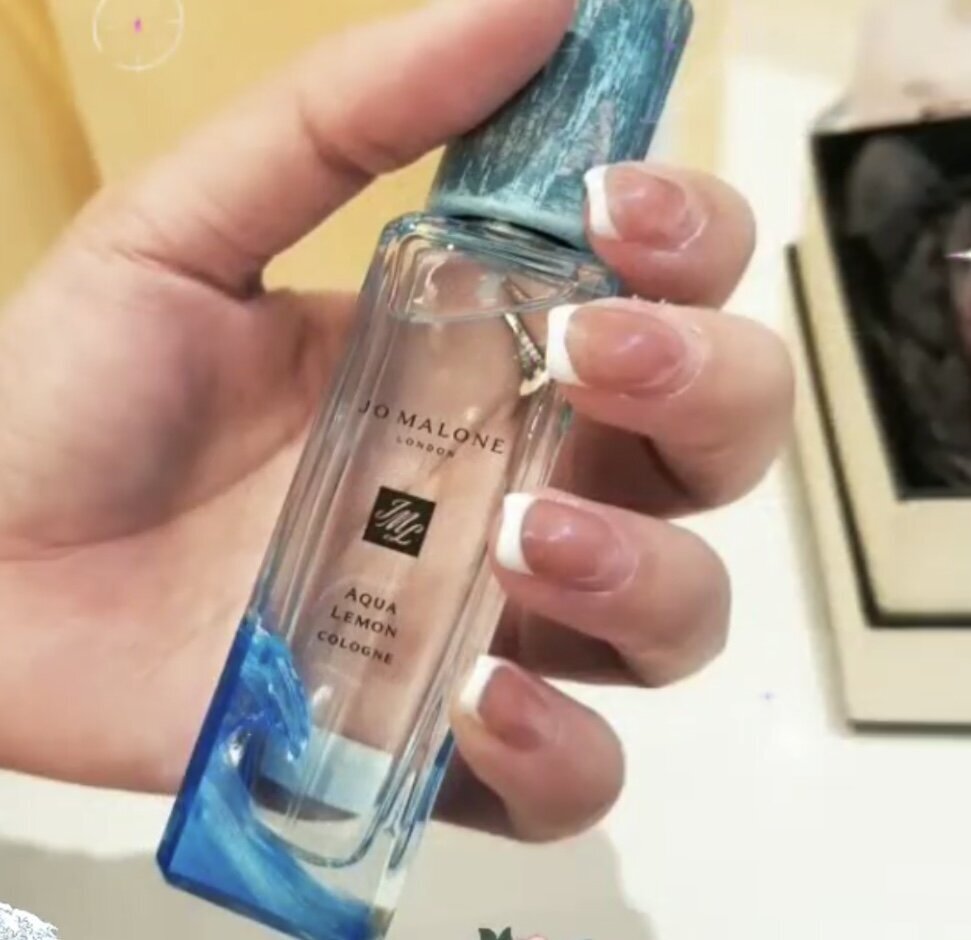 Wave design on perfume bottle for luxury brand Jo Malone by Toronto bottle painter Jenny Zhang