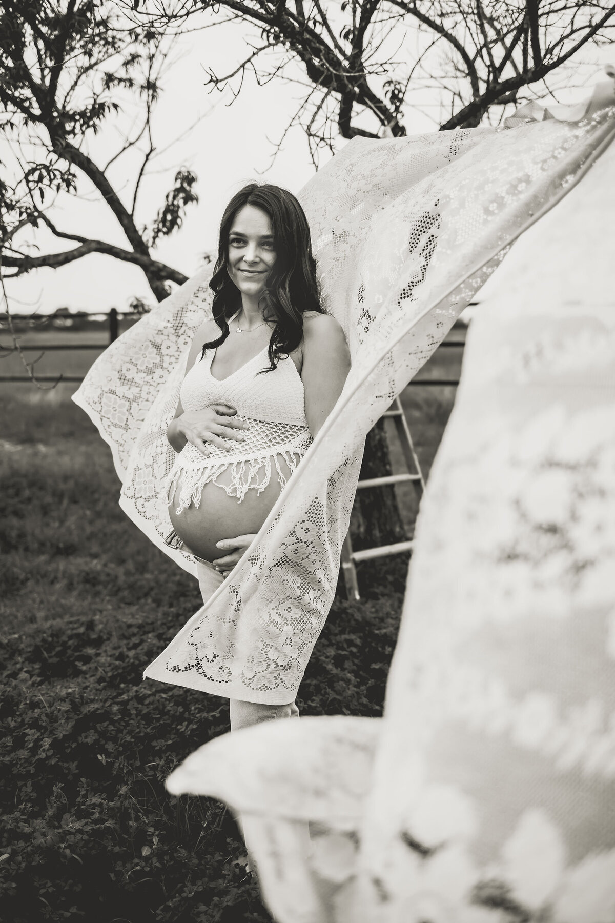 pregnant momma with her bare belly boho session