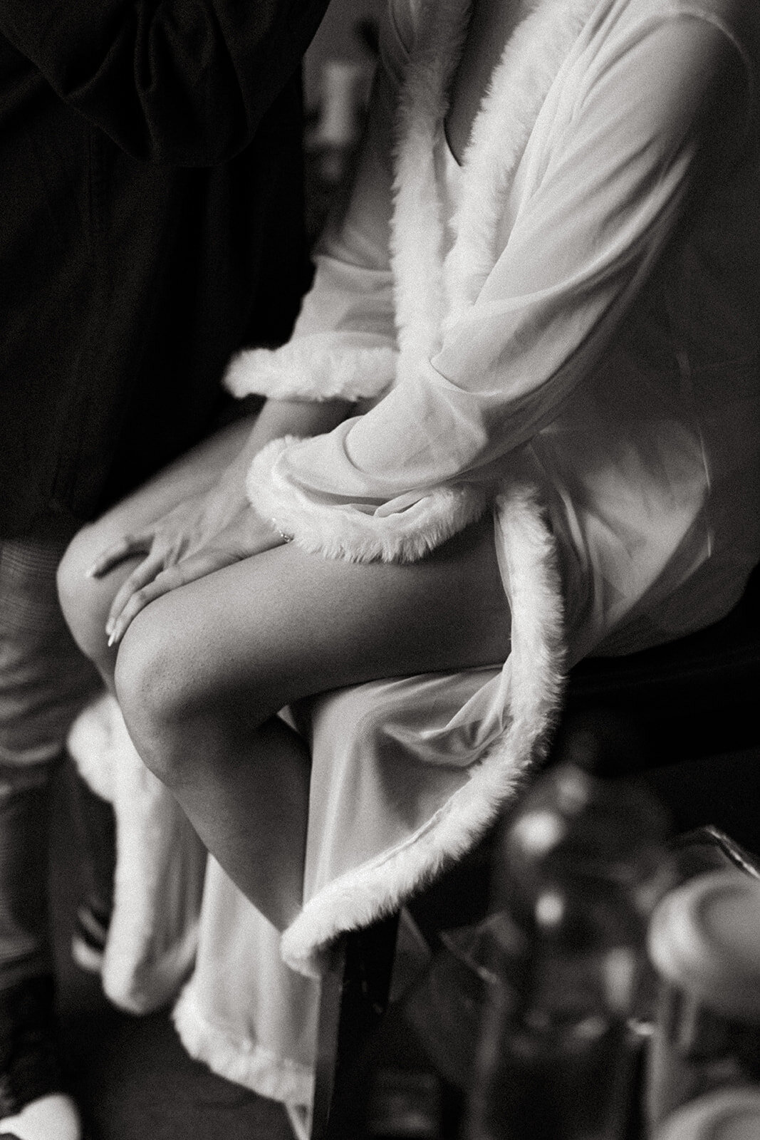 Bride getting ready in robe