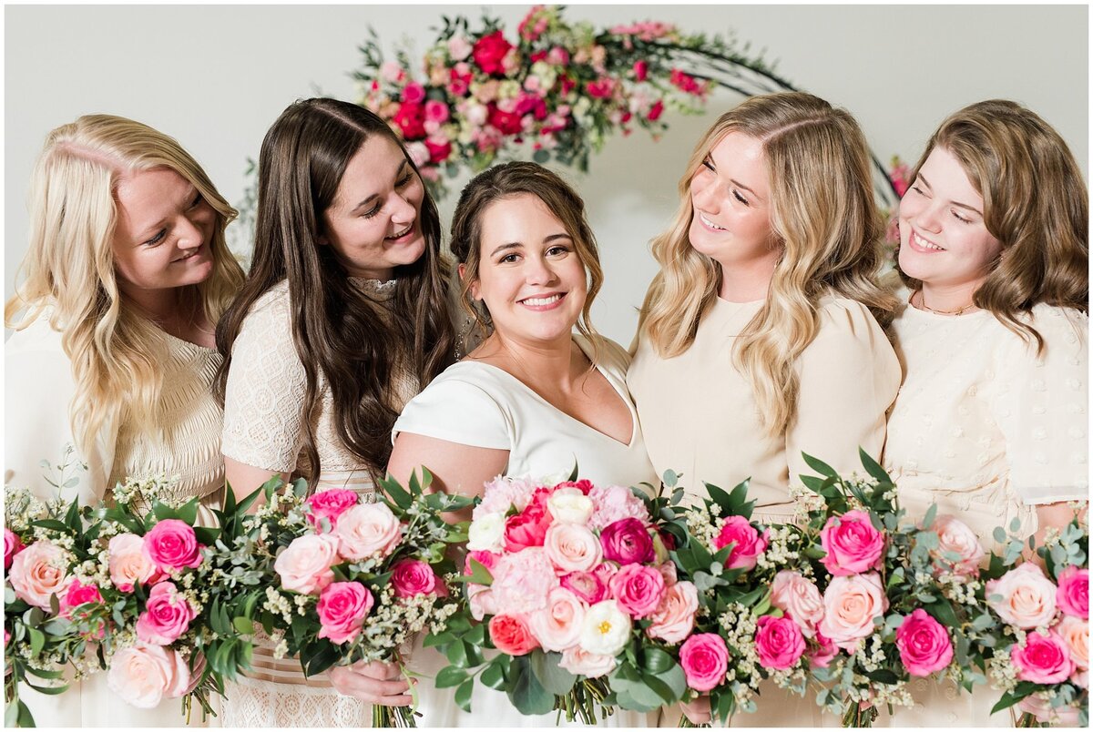 Bride with bridesmaids at Talia Event Center